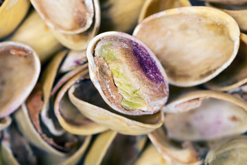  Dried pistachio nuts with and without shell, macro close up   