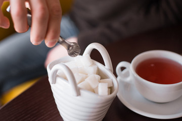 sugar is thrown in tea