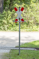 St. Andrew's cross indicating narrow gauge railway in the Great Garden of Dresden