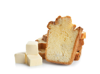 Delicious sliced butter cake on white background