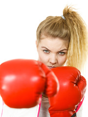 Woman wearing boxing gloves