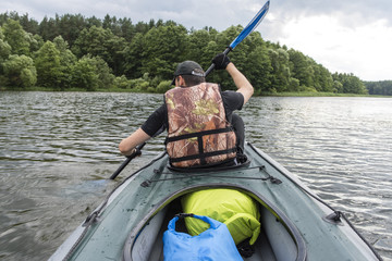 A man rowing a kayak