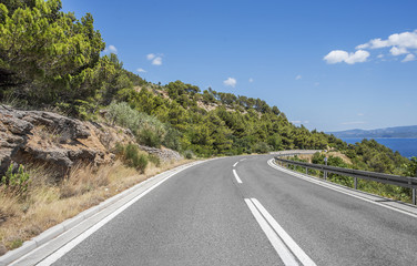 Country road for cars along the sea coast.