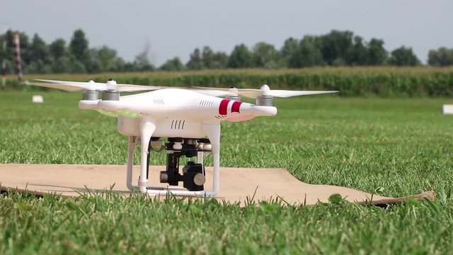 Small drone during take off outside, close up full HD video