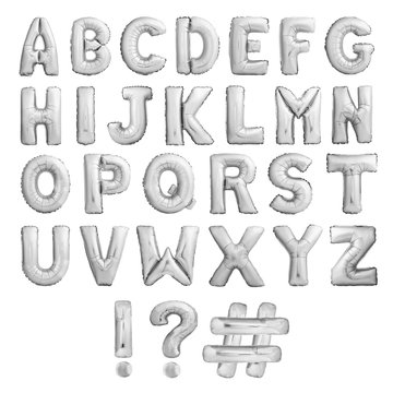 Full english alphabet with exclamation point, question mark and hashtag of silver inflatable balloons isolated on white background