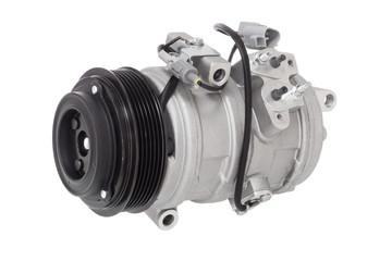 automotive air conditioning compressor on a white