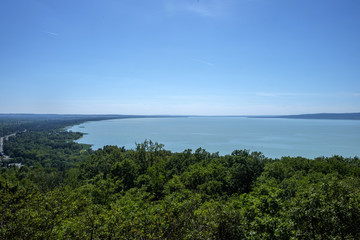 blue water, green hills and long bay - summertime and recreation at Balaton lake