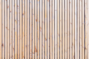 Rustic natural wooden vertical planks with cracks, scratches for natural design, patterns, extured background with space for text.