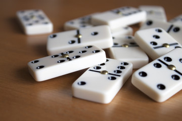 Domino Tiles on Wooden Table