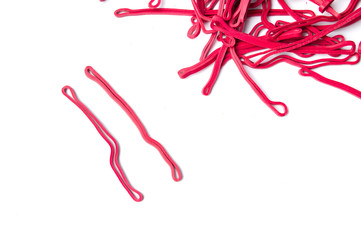 Red rubber bands isolated on white