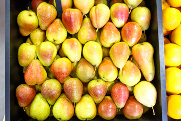 Pears on the shelves in the supermarket