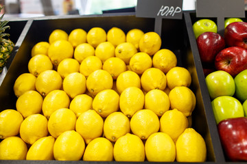 Lemons are on the shelves in the supermarket