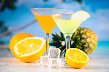 Colorful summer background with drink and palms