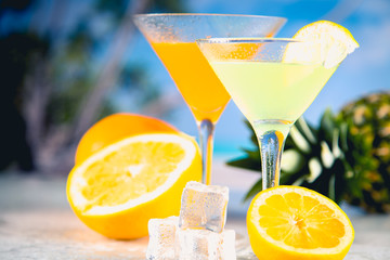 Colorful summer background with drink and palms