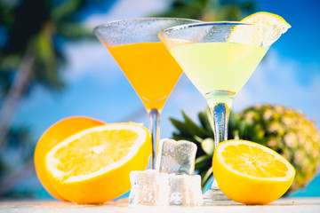 Colorful summer background with drink and palms