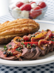 Sliced Steak with Vegetable Sauce Cheesy Potato and Caprese Salad