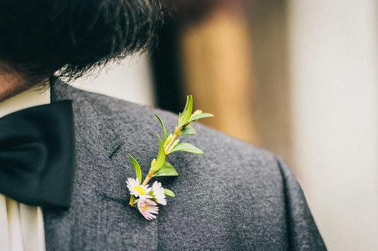 Daisy Flowers in his Buttonhole