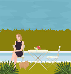 girl sitting alone with the dog on side of swimming pool