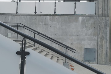 Concrete steel and glass stairs in urban scenery 