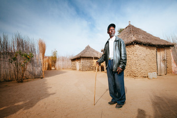 African Hambukushu man standing in his kraal