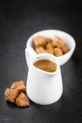 Portion of Caramel Sauce on a slate slab