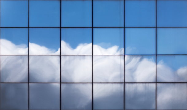 The Sky Reflected on an Office Building