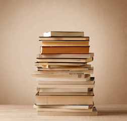 A stack of books with vintage background