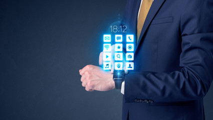 Businessman wearing smartwatch.