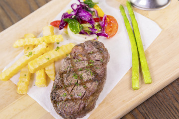 Beef steak with spices and salad