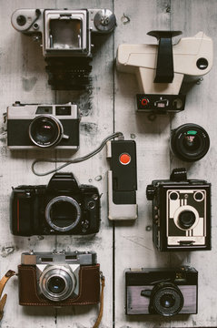 The Old Cameras on a White Board