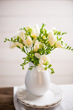 freesias on a jar