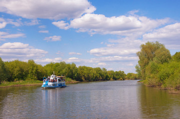Trubezh river with a pleasure boat in the Ryazan region. Central Russia