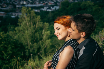 couple have a date on the peak of the hill