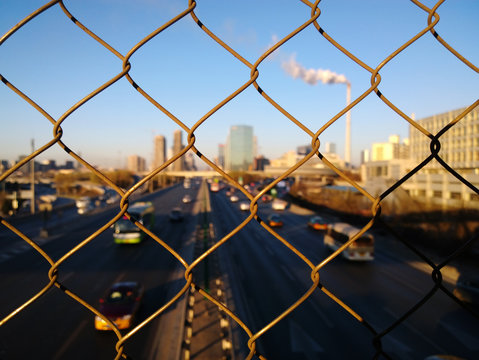 The barbed wire fence and highway 