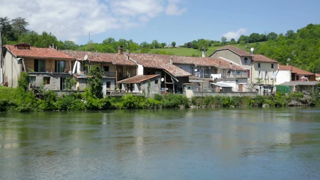Houses near the hill on the Salat river in France
