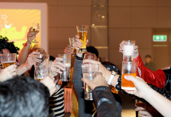 glasses with alcohol and toasting, party