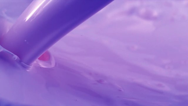 Pouring Medium Gray-Purple paint.