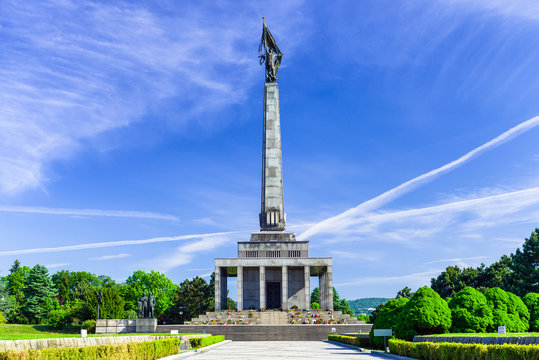 Slavin war memorial in Bratislava national landmark with tall statue and historic cemetery in green park setting