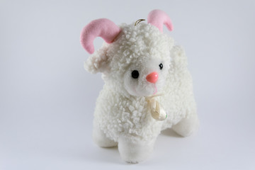 sheep doll isolated on white background
