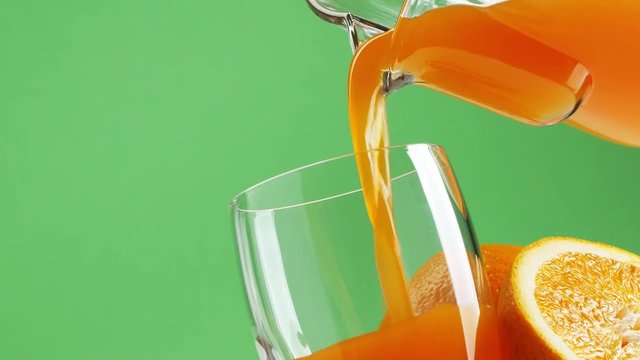 Pouring fresh orange juice