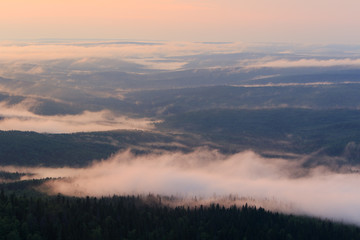 Evening view of the misty valley
