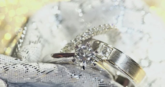 Macro shot of Wedding rings with textured background. Wedding theme.