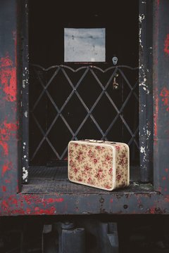 Vintage Suitcase on Train