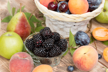  Healthy food, healthy eating - blackberry and other organic fruits on table
