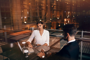 Fototapeta na wymiar Business people waiting at airport lounge with laptop