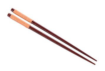 Wooden pairs of chopsticks on white background