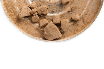 crushed bronzing powder for face isolated on white background
