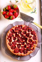 Strawberry cake, sliced and served