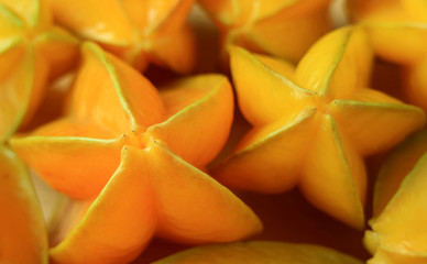 Bunch of vibrant color ripe Star Fruits in Thailand, with Selective Focus 