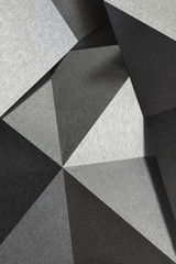Geometric shapes of silvery paper, background